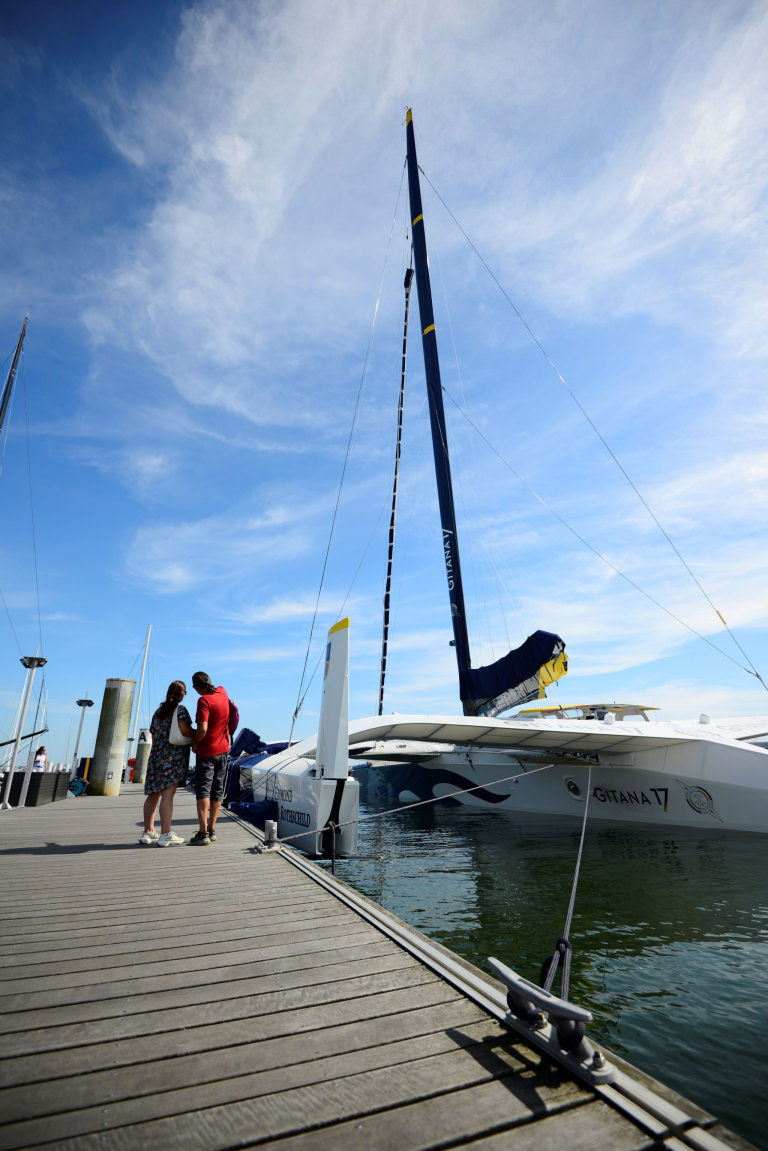 Bateau Ultim Gitana sur les pontons du pôle course au large de Lorient La Base (Morbihan)